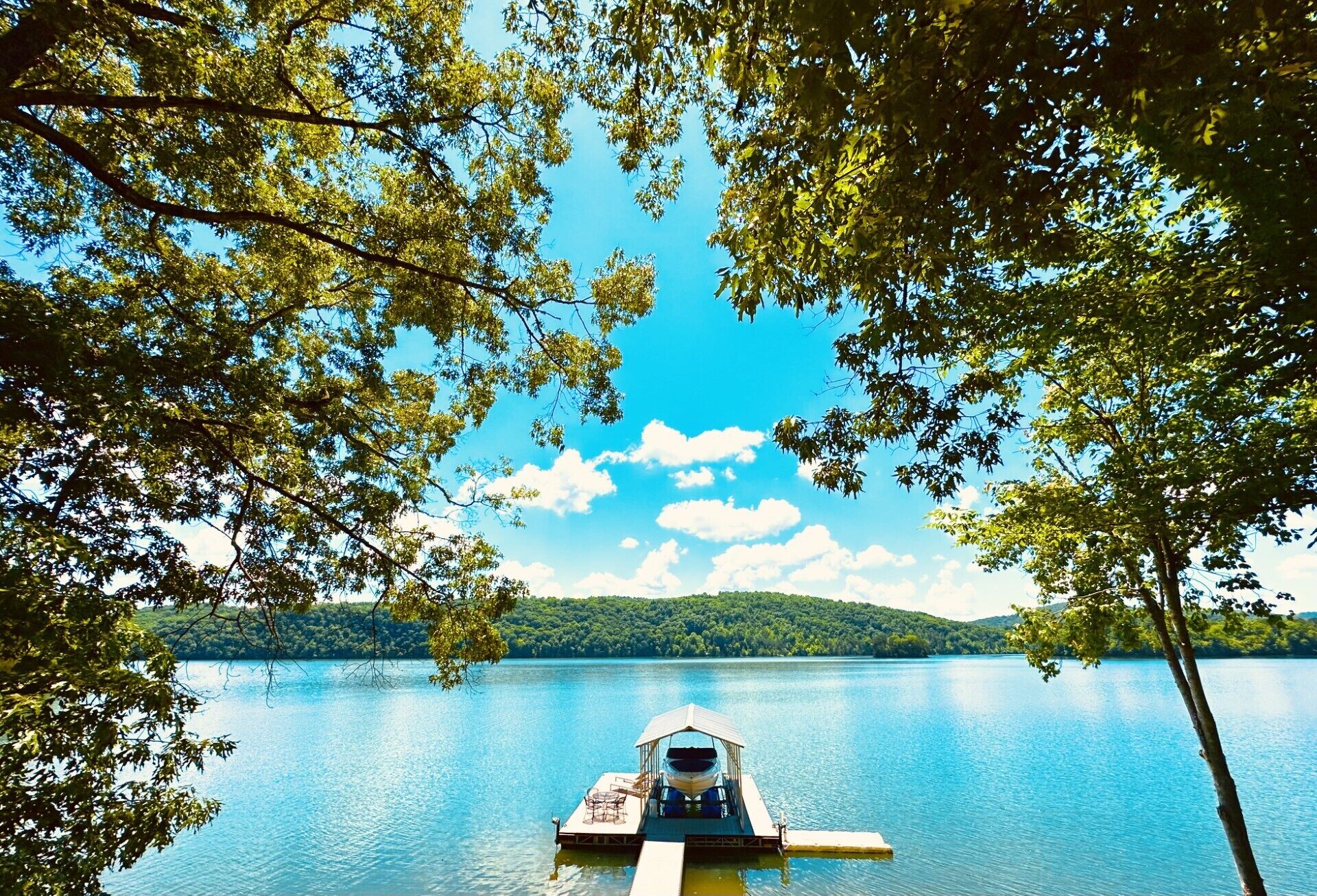 Private dock, tie ups on either side, jet ski port, lounger area, swim up ladder