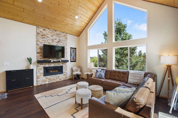 Open concept living room with views to die for.