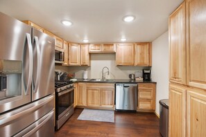 Fridge, microwave, oven, stovetop - Cozy Forrest Escape with Hot Tub & Scenic Views (Woodland Park)