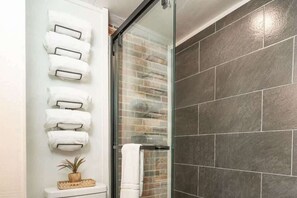 Shower, hair dryer, shampoo
