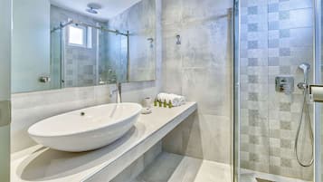 Hair dryer, towels, soap, shampoo
