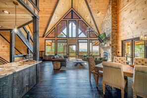 Enjoy expansive views of the surrounding landscape from the large windows in this interior space.