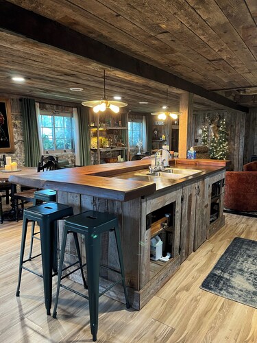 Cozy up in this rustic Stone Lodge and relax by the fireplace