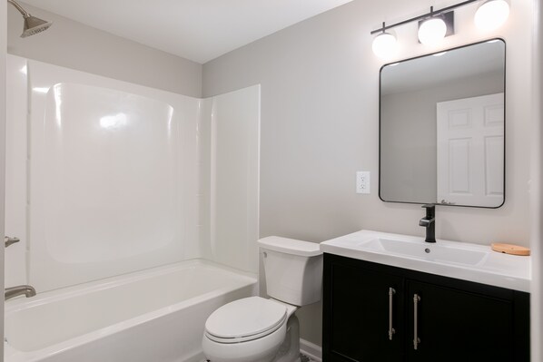 Combined shower/bathtub