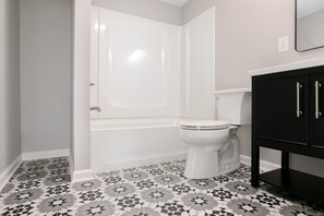 Combined shower/bathtub