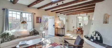 Smart TV, fireplace, books, offices