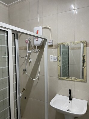 Hair dryer, towels, soap, shampoo