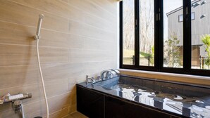 A modern bathroom with a large window, a black sink, and a shower. - Rakuten STAY VILLA Nasu (Nasu)