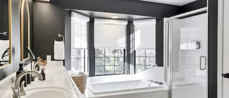 Bathtub, hair dryer, towels, soap