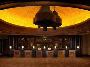 Experience the grandeur of our lobby, featuring a stunning vaulted ceiling and beautifully crafted reception desks.