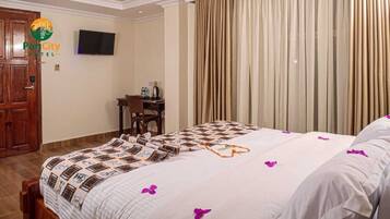 Deluxe Single Room, 1 Bedroom | In-room safe, iron/ironing board, WiFi (free)