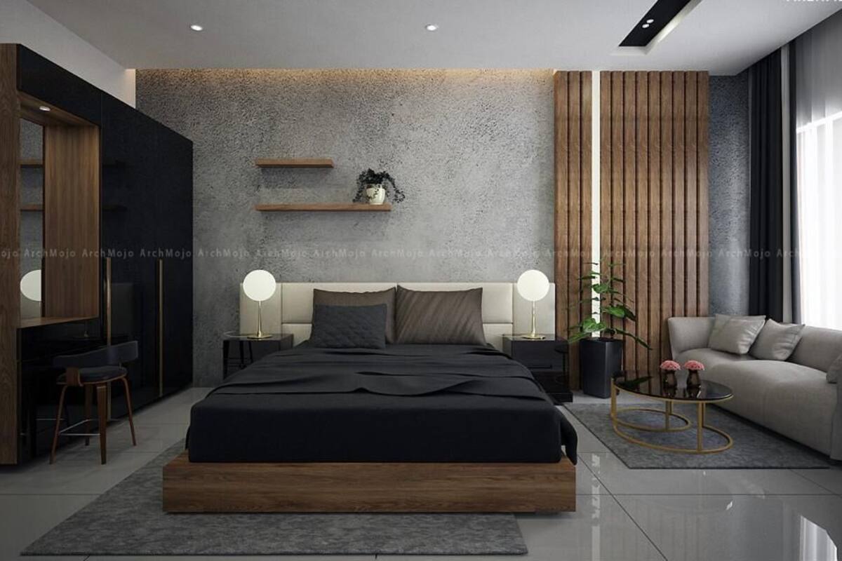 Ein modernes Schlafzimmer mit einem großen Bett, Nachttischen, einer Couch und einem an der Wand befestigten Regal.