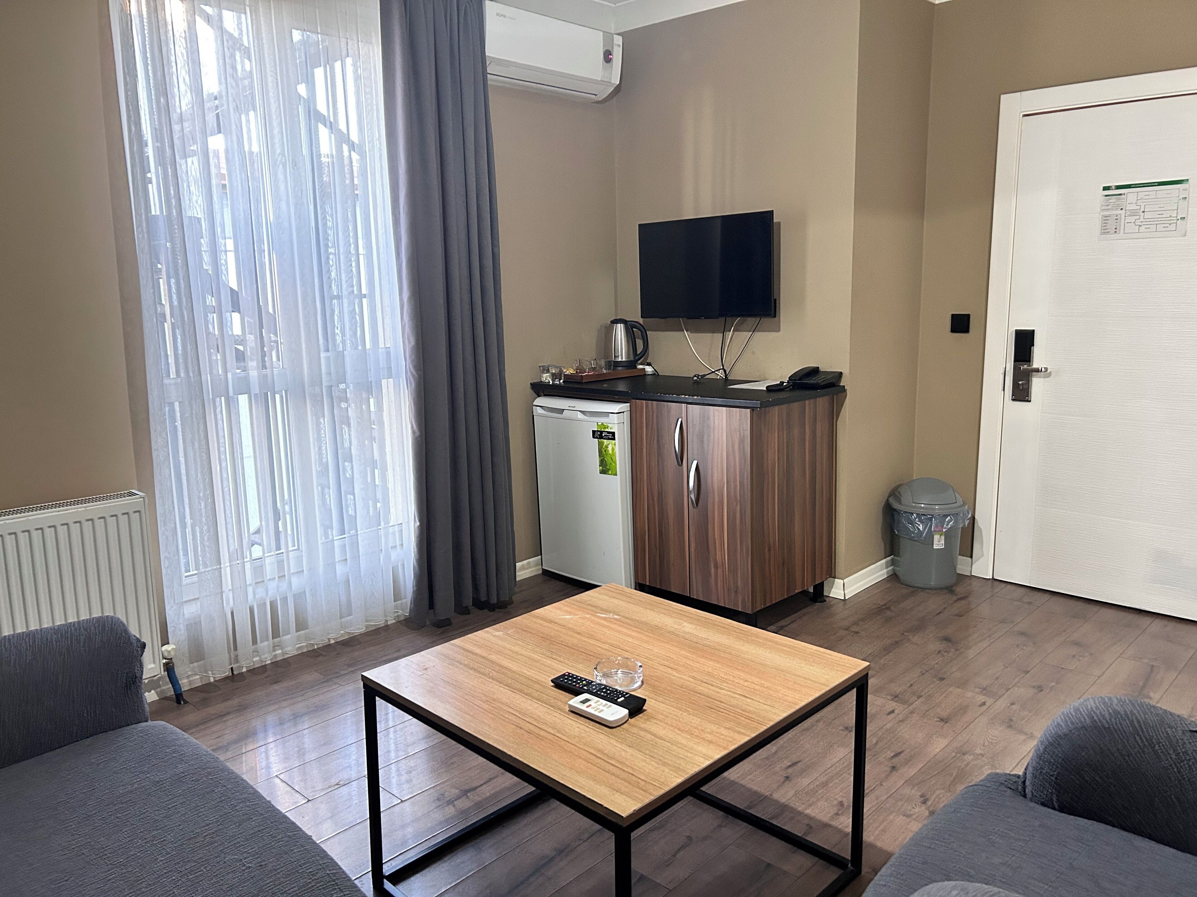 Family Apartment | Living area | Flat-screen TV, computer monitors, printers