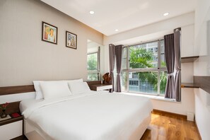 Familie appartement | Luxe beddengoed, een bureau, geluiddichte muren