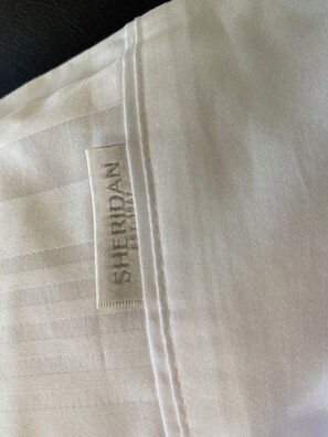 Bathtub, hair dryer, towels, soap