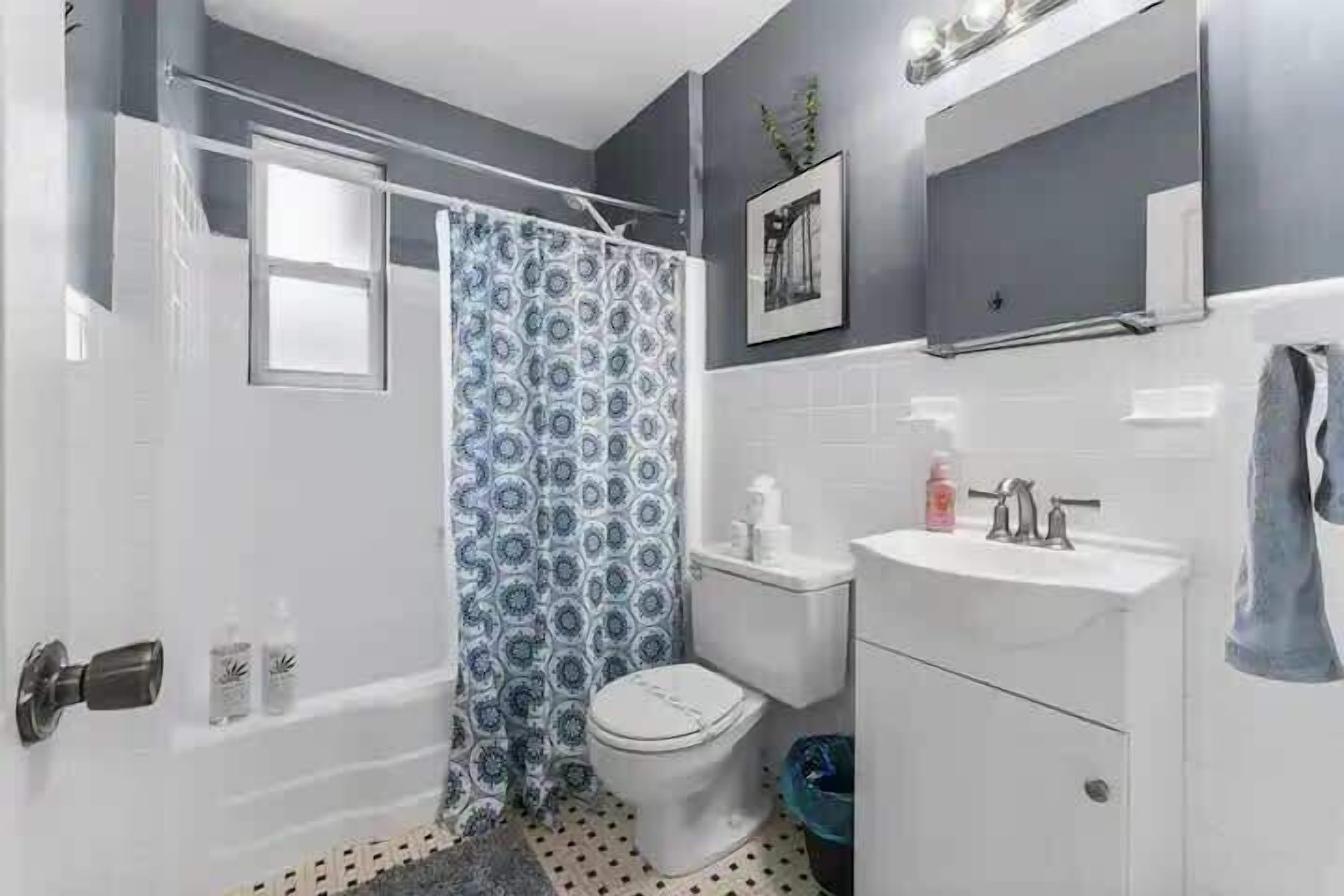 Shower, hair dryer, towels, shampoo