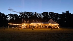 A large building with multiple windows and a lawn area in front. - Villa Parkbos (De Pinte)