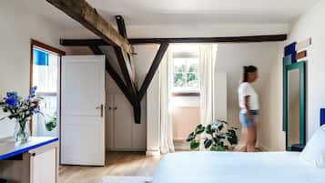 Habitación Deluxe | Ropa de cama de alta calidad, edredón y minibar