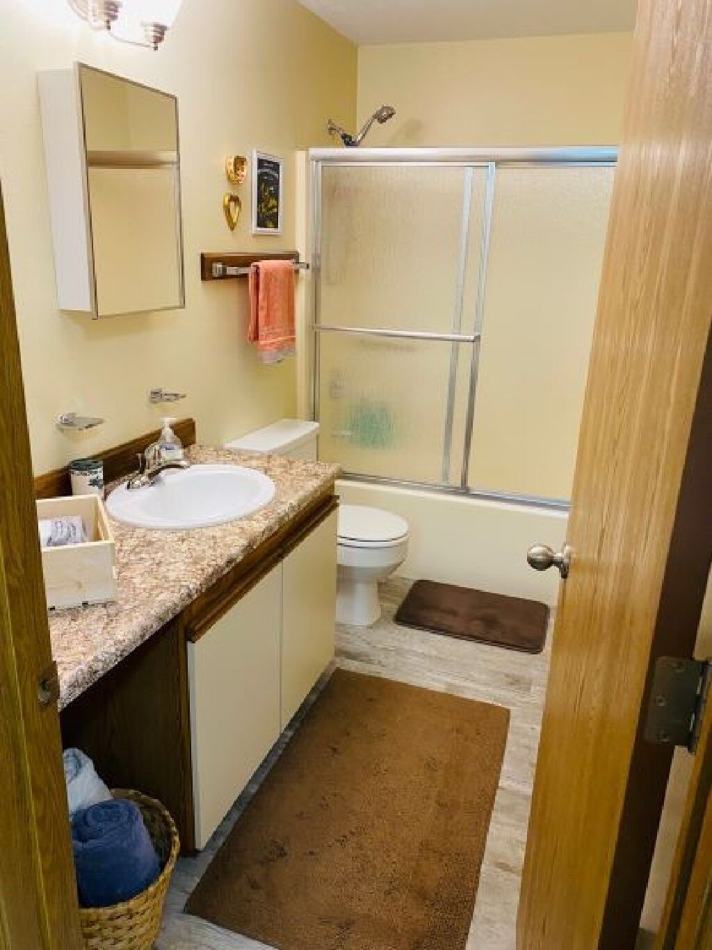 Combined shower/tub, hair dryer, towels, toilet paper