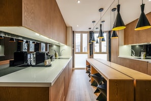 Fridge, microwave, coffee/tea maker, toaster