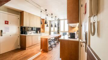 Fridge, microwave, coffee/tea maker, toaster