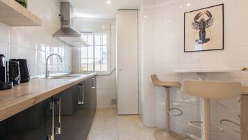 Fridge, microwave, coffee/tea maker, electric kettle
