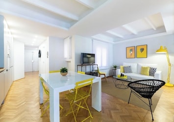 General view of the living room and entrance hall to the apartment