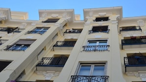 A multi-story building with balconies and windows. - Incredible design apartment 6C (Madrid)