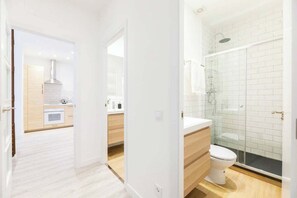 Shower, hair dryer, towels, soap