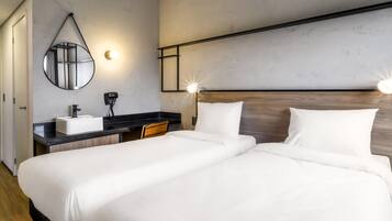 Chambre Standard, 2 lits une place | Coffres-forts dans les chambres, chambres insonorisées