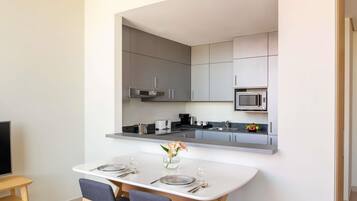 Apartamento, 1 habitación | Ropa de cama de alta calidad, colchones viscoelásticos, caja fuerte