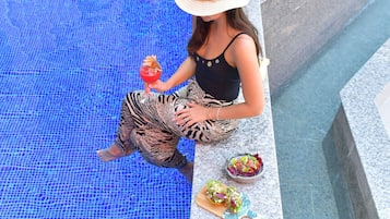 Outdoor pool, open 8:00 AM to 10:00 PM, pool umbrellas, sun loungers