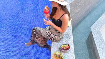 Outdoor pool, open 8:00 AM to 10:00 PM, pool umbrellas, sun loungers