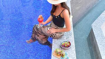 Outdoor pool, open 8:00 AM to 10:00 PM, pool umbrellas, sun loungers