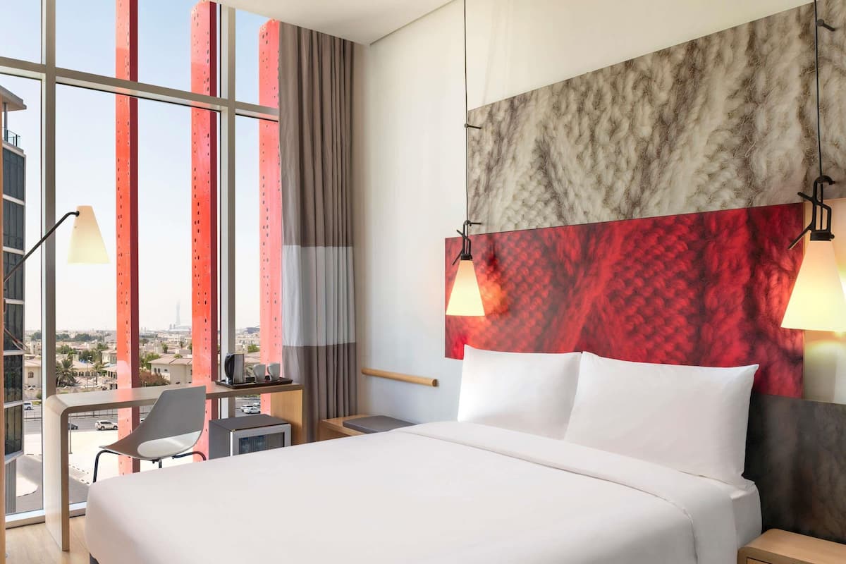 Premium bedding, memory foam beds, minibar, in-room safe