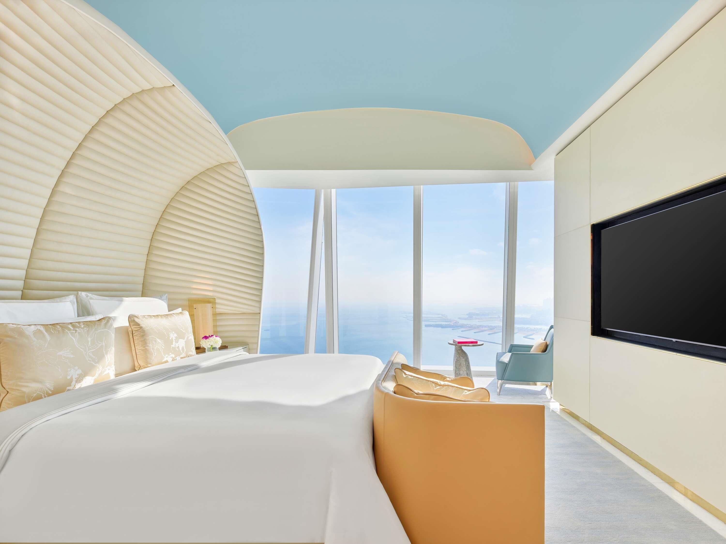 Grand suite, uitzicht op zee | Lakens van Egyptisch katoen, luxe beddengoed, een minibar