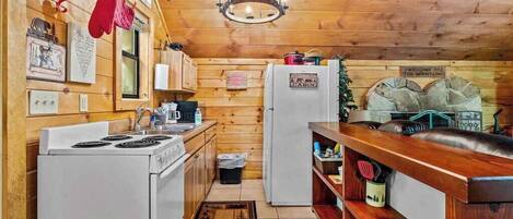 Coffee/tea maker, fridge, microwave, oven