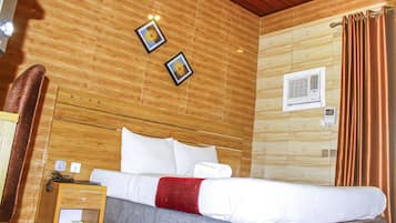 Habitación clásica | 1 dormitorio, ropa de cama de alta calidad, mobiliario individual
