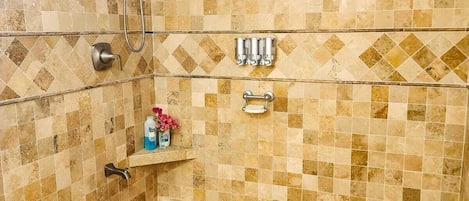 Shower, hair dryer, towels, toilet paper