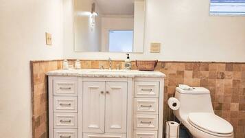 Shower, hair dryer, towels, toilet paper