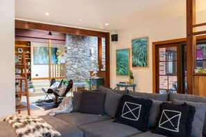 TV, fireplace, books