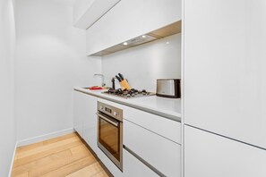 Fridge, microwave, oven, stovetop - Elegant 2-Bed Apartment With Expansive City Views (Prahran)
