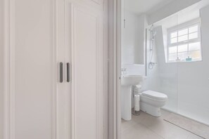 Basic Apartment, 1 King Bed with Sofa bed | Bathroom | Shower, hair dryer, towels, soap