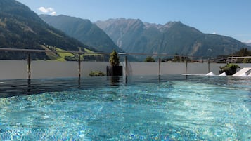 2 indoor pools, outdoor pool, open 8:00 AM to 9:00 PM, pool loungers