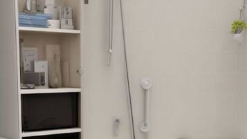 Shower, hair dryer, bidet, towels