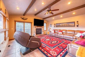 Smart TV, fireplace, books