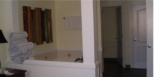 Combined shower/tub, hair dryer, towels, soap