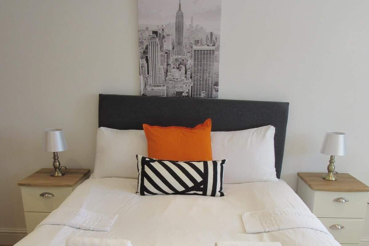 Habitación familiar | Sábanas de algodón egipcio y ropa de cama de alta calidad