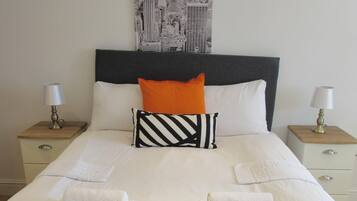 Family Room | Egyptian cotton sheets, premium bedding, individually decorated