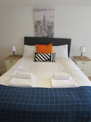 Habitación familiar | Sábanas de algodón egipcio y ropa de cama de alta calidad